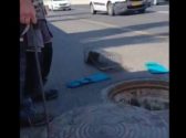 בור ביוב פתוח על כביש מהיר
